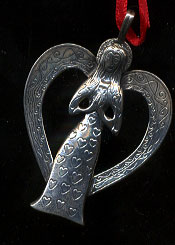 Angel on Heart ornament. 10.8 grams .925 Fine Silver