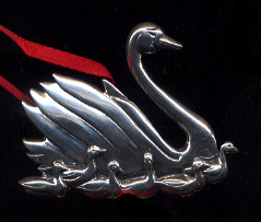 Seven Swans Swimming Ornament