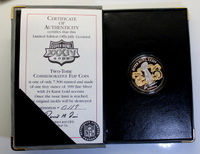 Super Bowl XXXIV Flip Coin 1 Troy Ounce .999 Fine Silver with 24Kt Gold accents.
